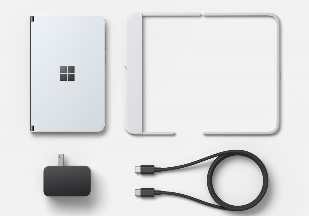 Fotografía oficial del contenido del empaque de la Microsoft Surface Duo.